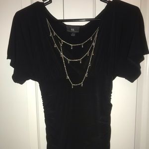 Black fitted blouse w/ removable builtin necklace.